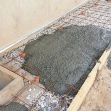 Какую марку бетона выбрать для заливки отмостки зданий?